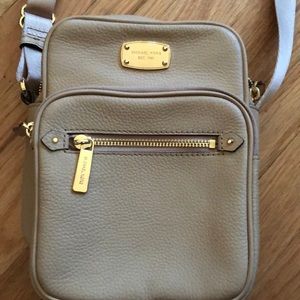 Michael Kors beige leather crossbody flight bag